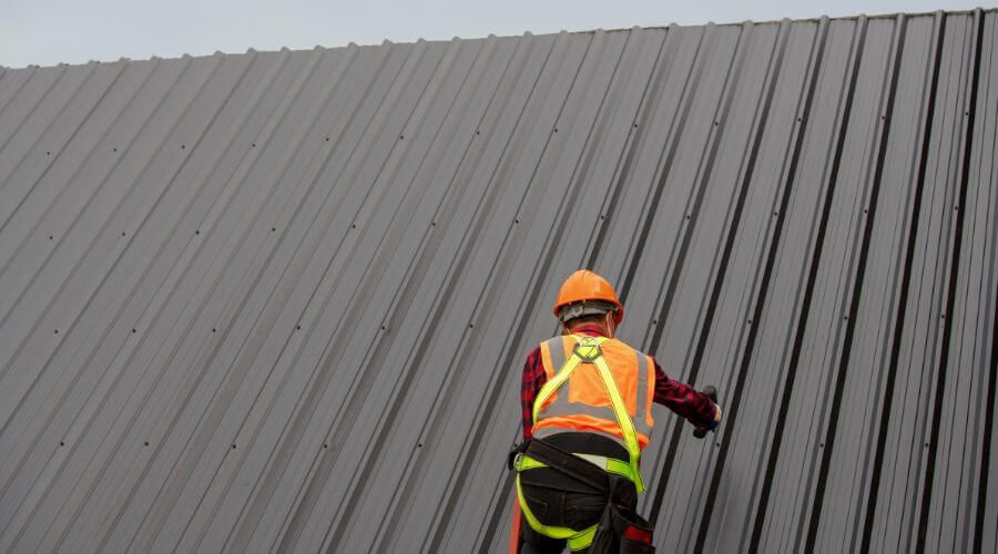 Professional metal roof installation services in Oral, SD